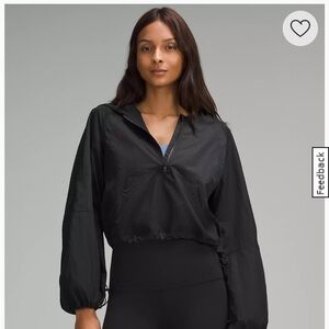 Black Lululemon cropped anorak water proof jacket